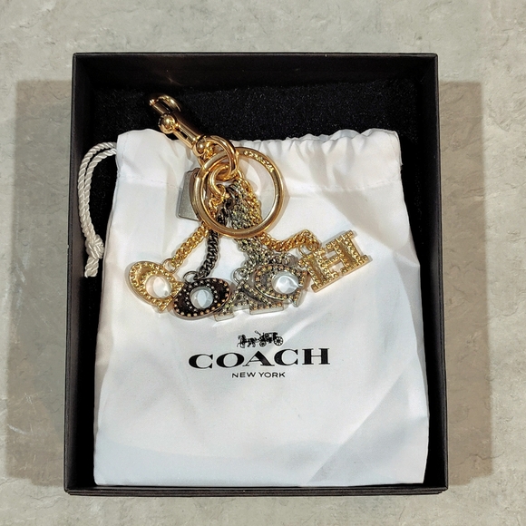 NWOT Coach Perforated Sparkle "COACH" Letters Gun Metal Bag Charm Keychain - Picture 4 of 7